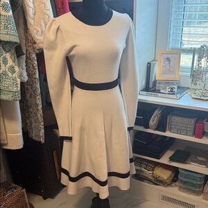 Elegant White Fit-and-Flare Dress with Black Trim